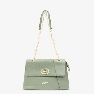 green UrbaN twist sling bag | cara